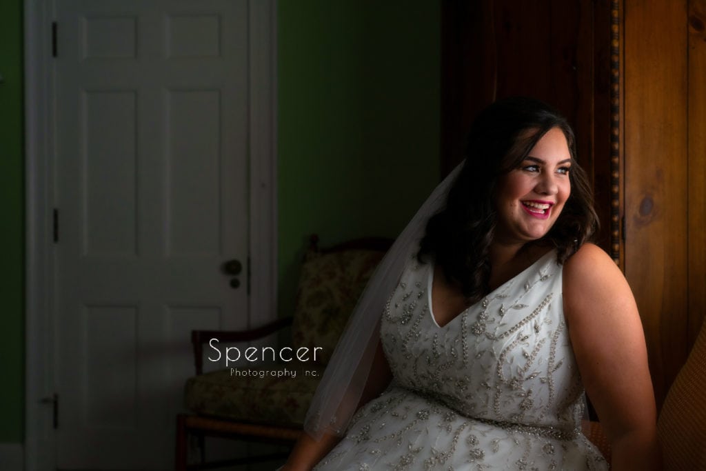 bride smiling in picture before her wedding at The Club at Hillbrook
