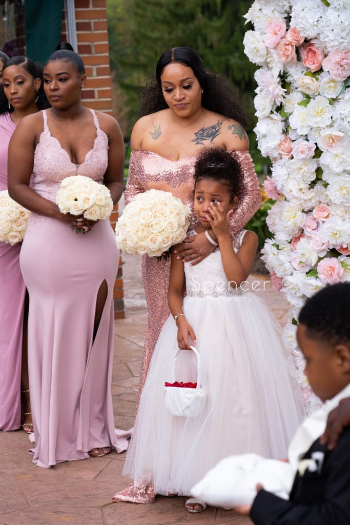flower girl crying at wedding ceremony at Glenmoor
