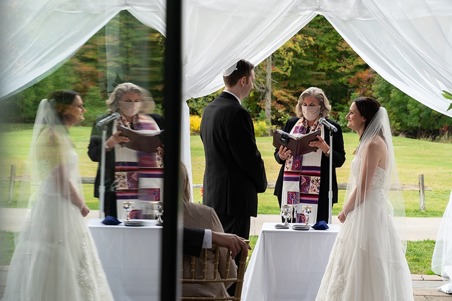 bride and groom looking at each other at Jewish wedding at Stonewater