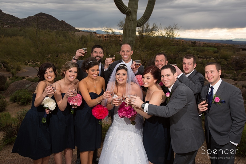 picture of bridal party outside of Troon North wedding reception