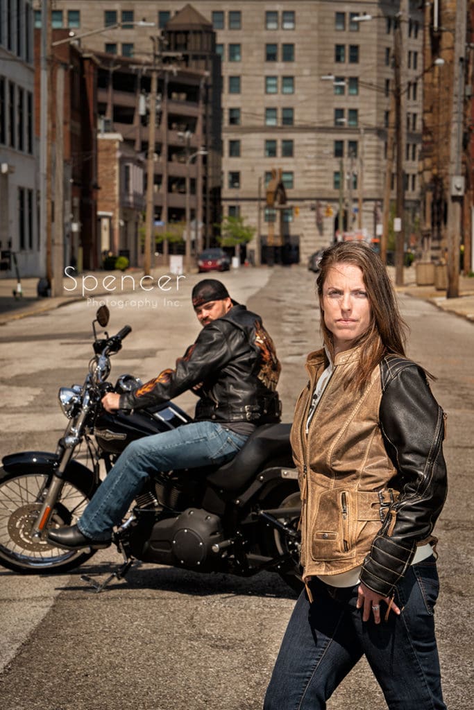couple standing in Cleveland street with motorcycle