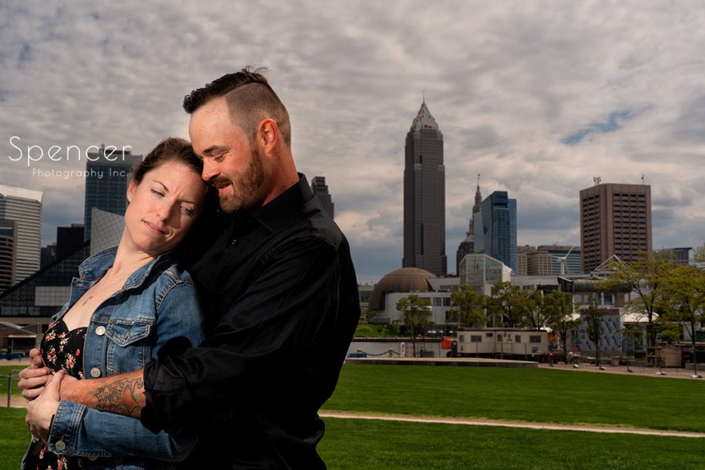 engagement picture in front of Cleveland skyline
