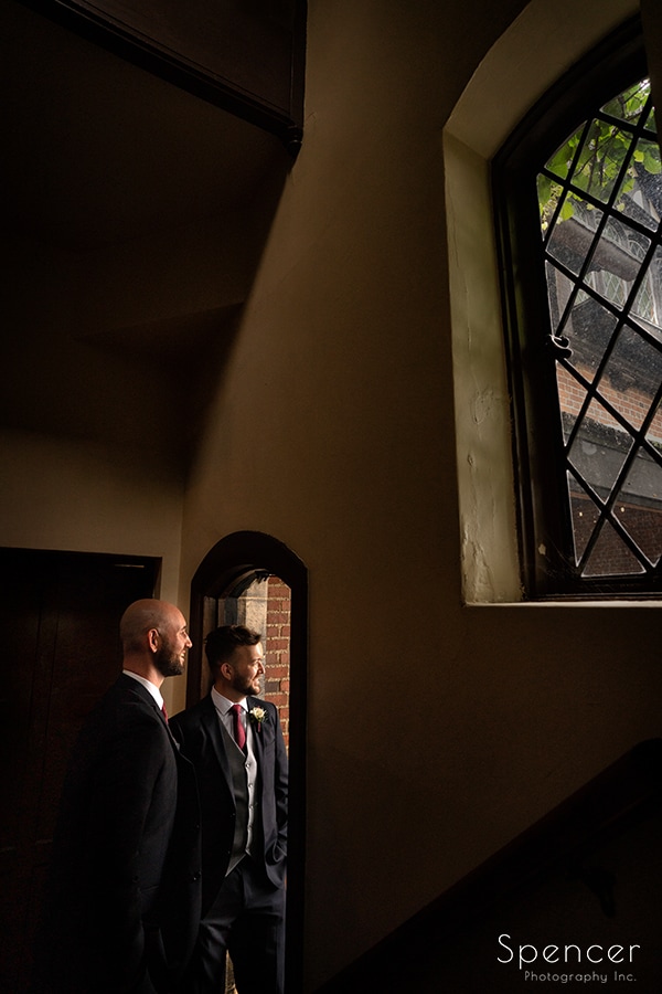  grooms posing at Stan Hywet before same sex wedding