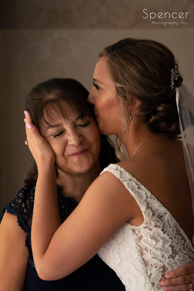  bride kissing mother