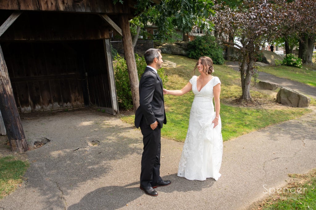 groom sees bride during first look at Patterson Fruit Farm