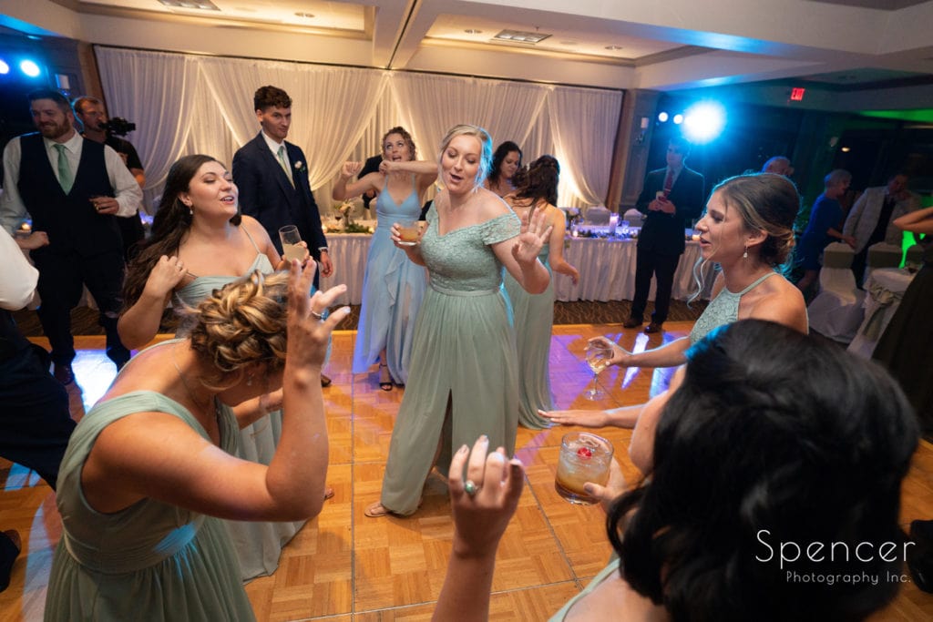  bridesmaids dancing at wedding reception