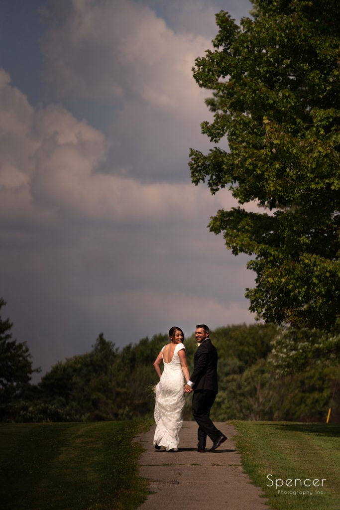 bride and groom walking to reception at Patterson Fruit Farm
