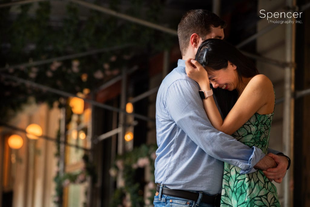 woman laughing in engagement pics in Manhattan
