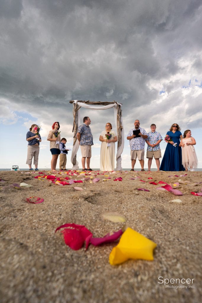 creative picture of wedding ceremony at Dock's Beach House