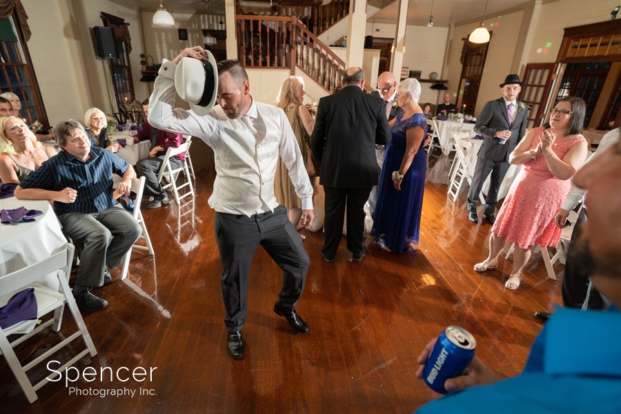 groom dancing at his wedding reception