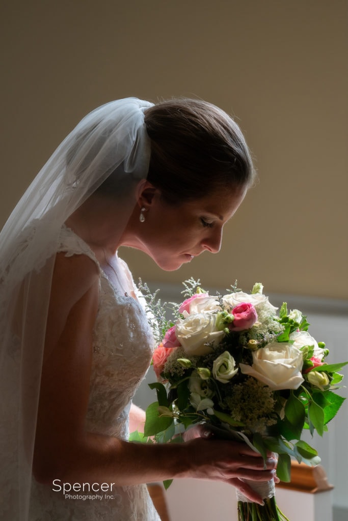  bride smelling her flowers