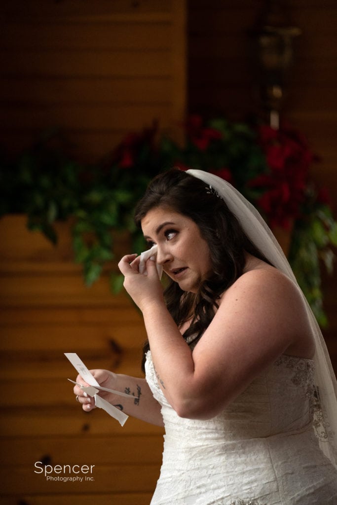 bride reacting to groom note