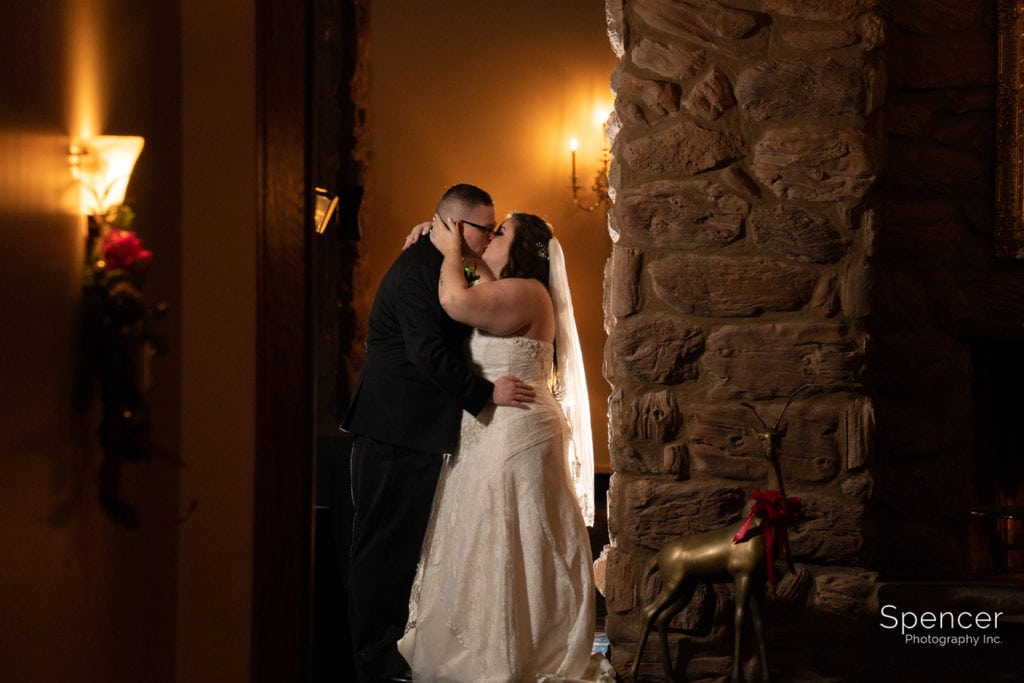 bride and groom kiss after wedding at Prestwick Country Club