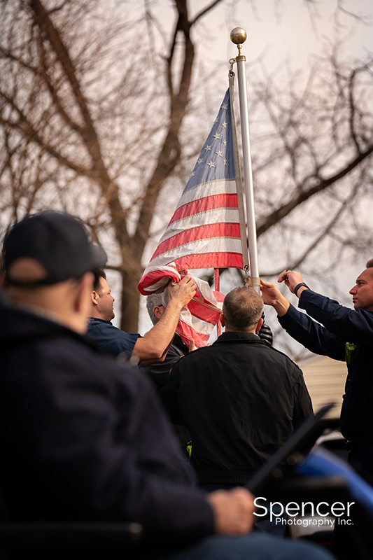 navy vet watching flag raising