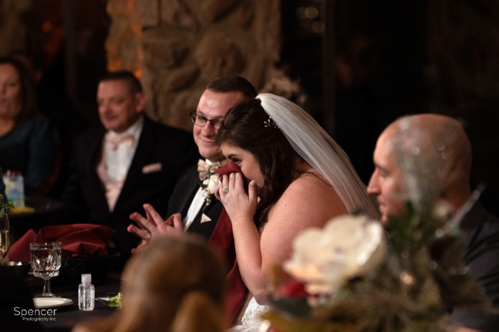 bride reacting to maid of honor speech