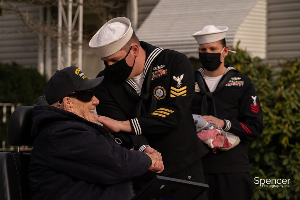 navy vet being congratulated in Akron