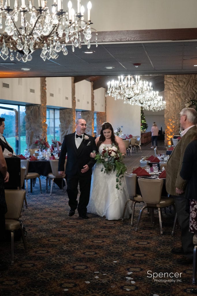 bride walking down aisle at wedding ceremony at Prestwick Akron