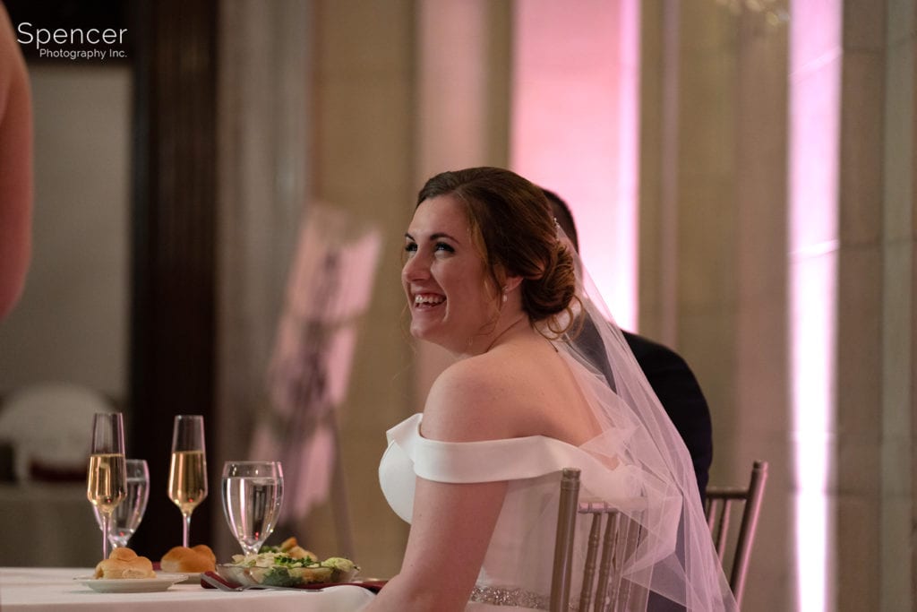 bride reacting to maid of honor speech at Ariel Pearl reception