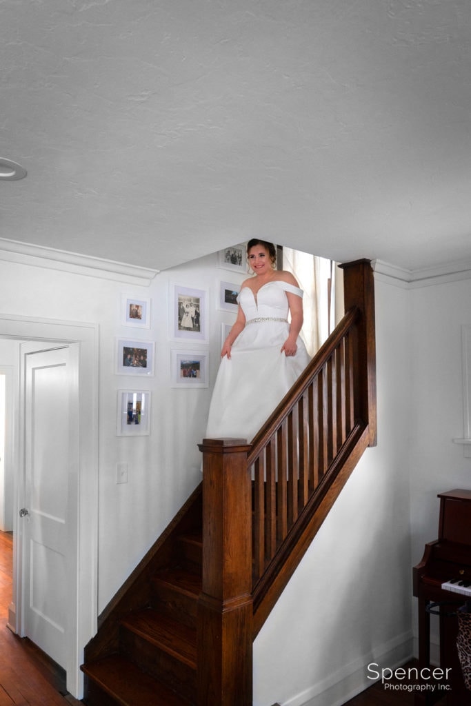  bride walking down stairs
