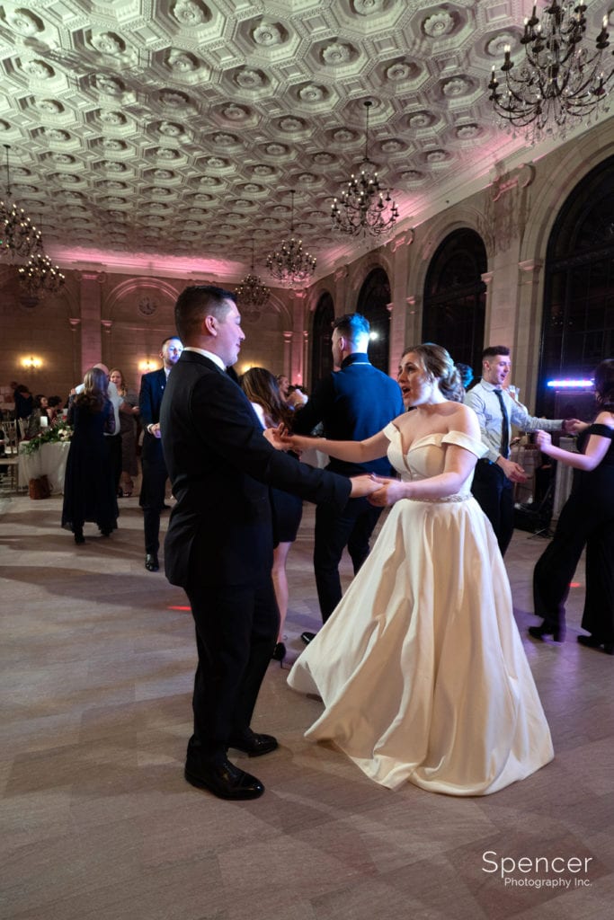 bride and groom dancing at wedding reception