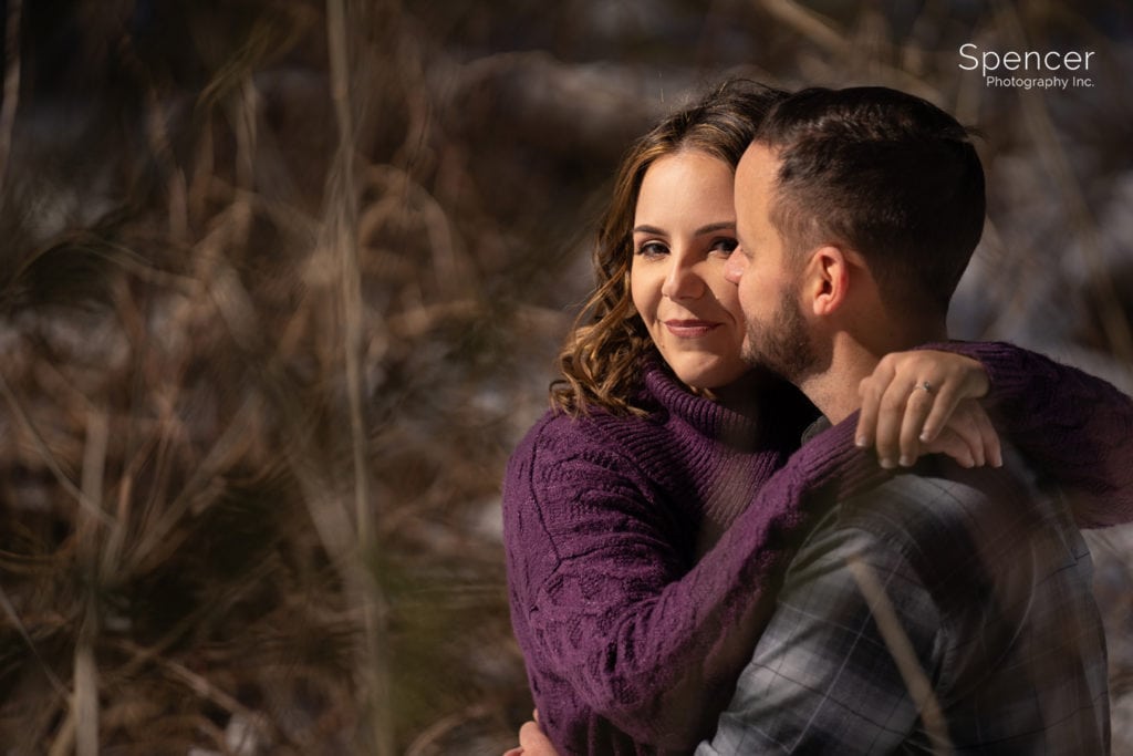 couple hugging in engagement picture at Brandywine Falls