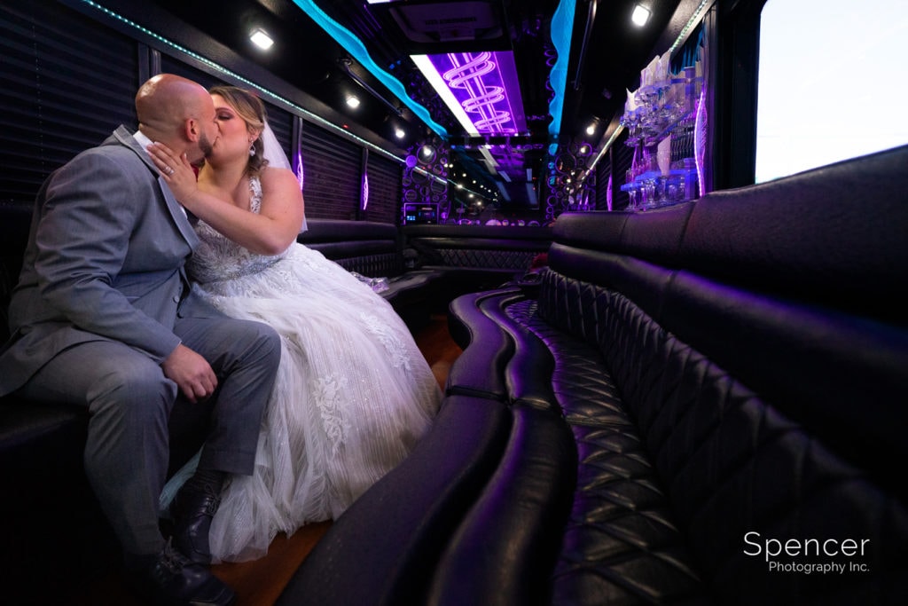 cleveland bride kissing groom in limo