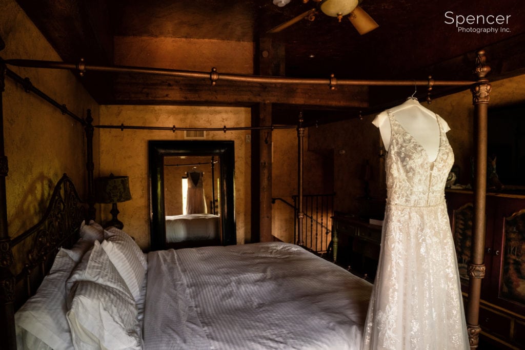 brides dress hanging in suite at Gervasi