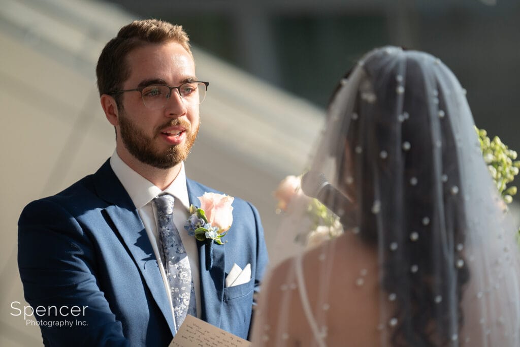 groom looking at bride at Akron Art Museum
