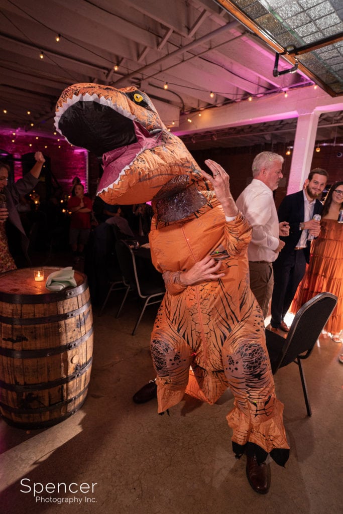 groomsmen dressed as dinosaur at Great Lakes Brewing reception