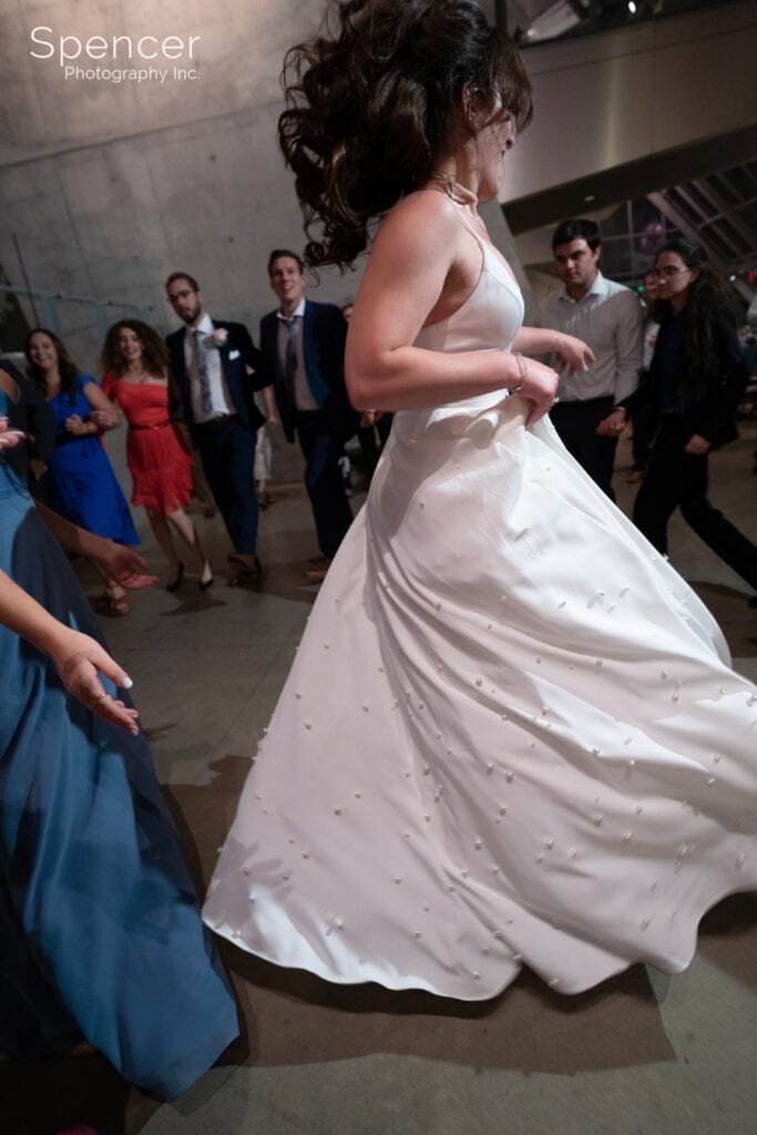 bride dancing at Akron Art Museum
