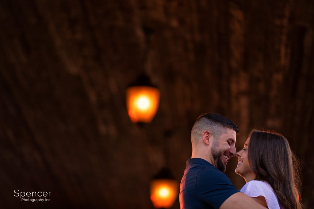 couple laughing in engagement picture at South River WInery