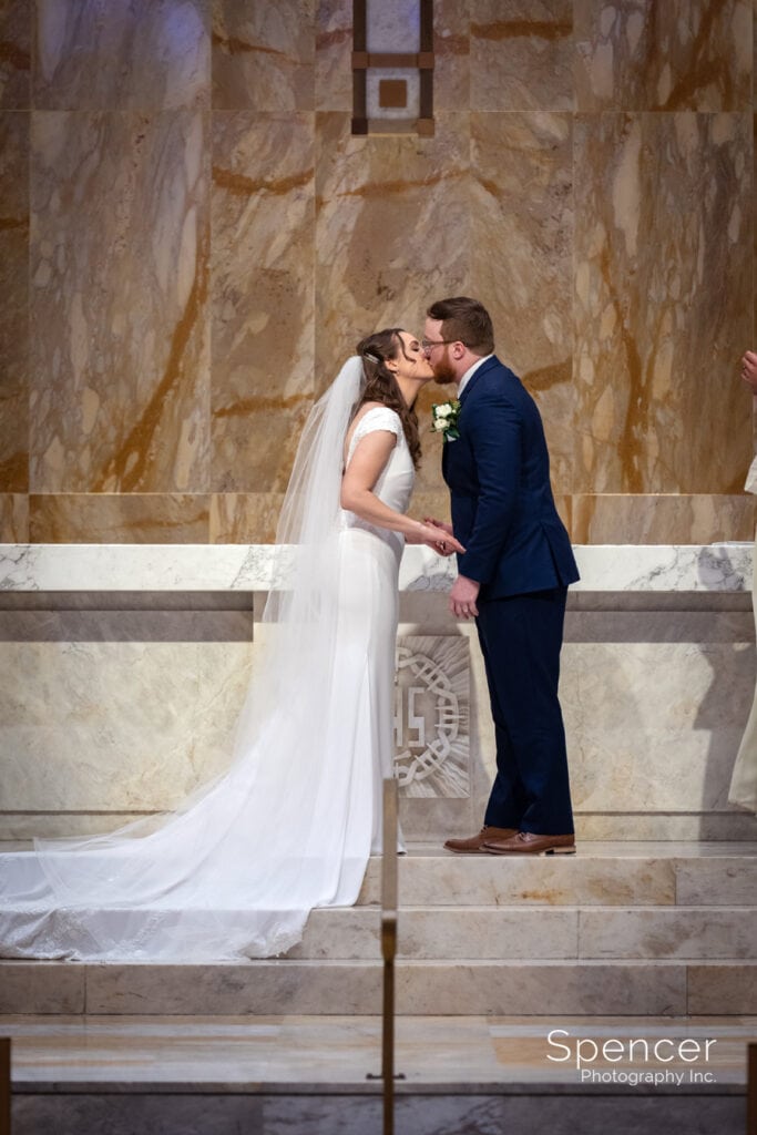 first kiss at wedding at church of the Gesu