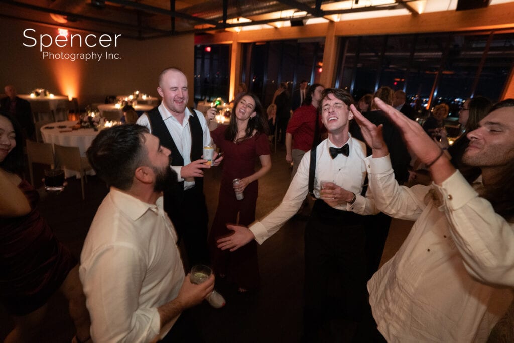 groom dancing at wedding reception at Truss