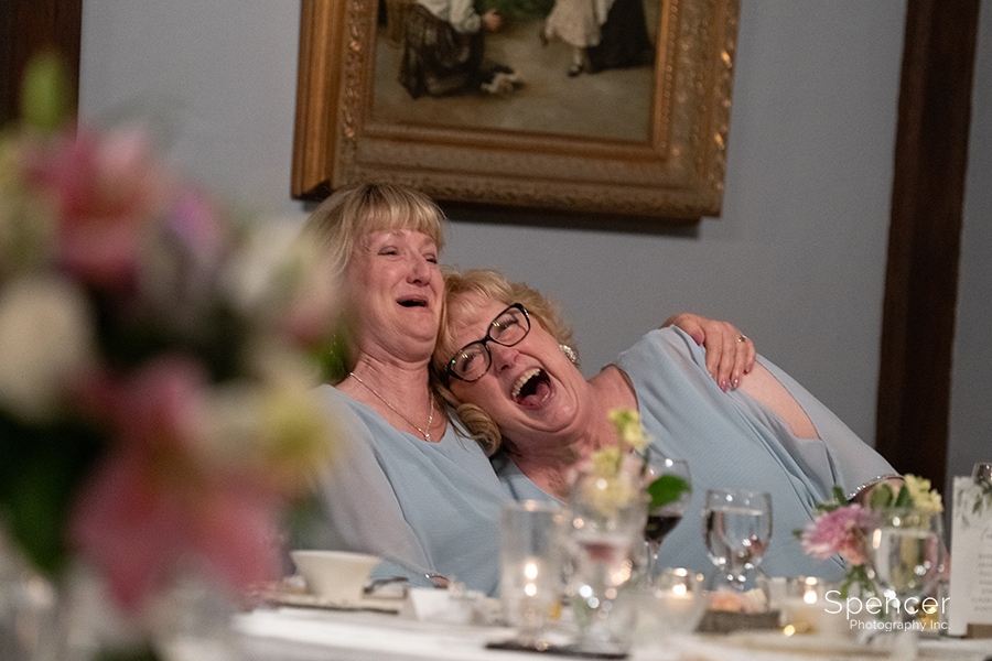 bridesmaids laughing at O'Neil house reception