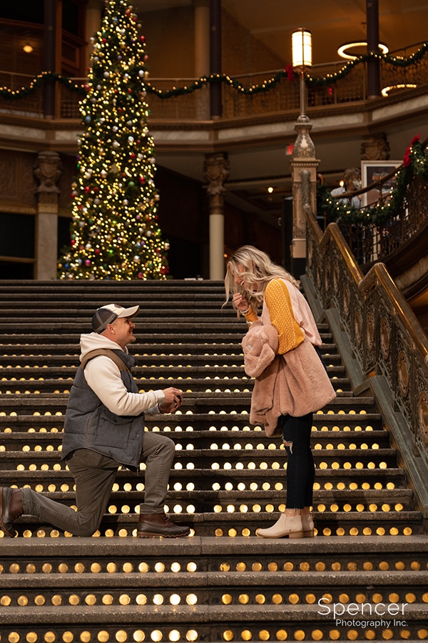 man proposes to woman in Cleveland at Christmas