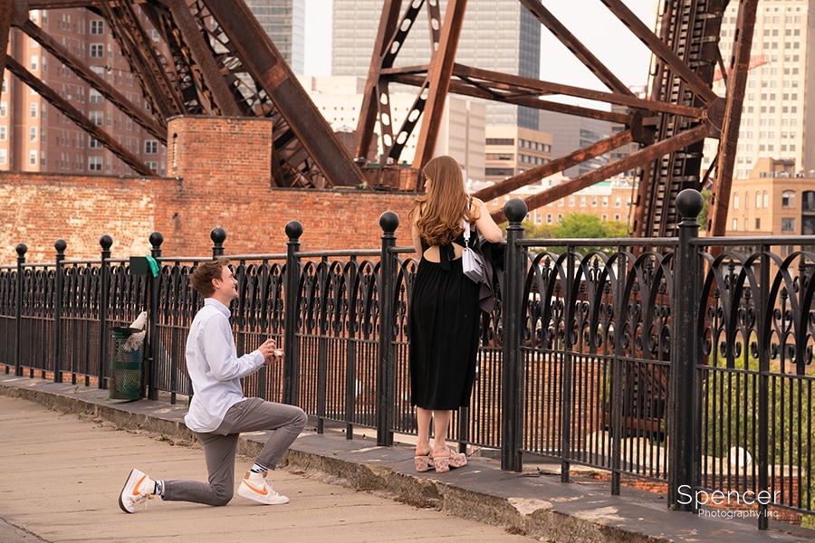 man proposes to woman in Cleveland West Bank