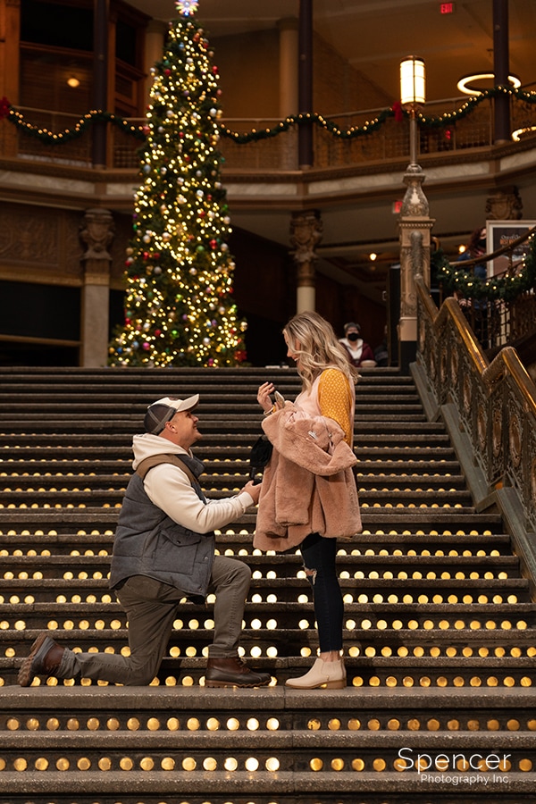 man proposes to woman in Cleveland at Christmas