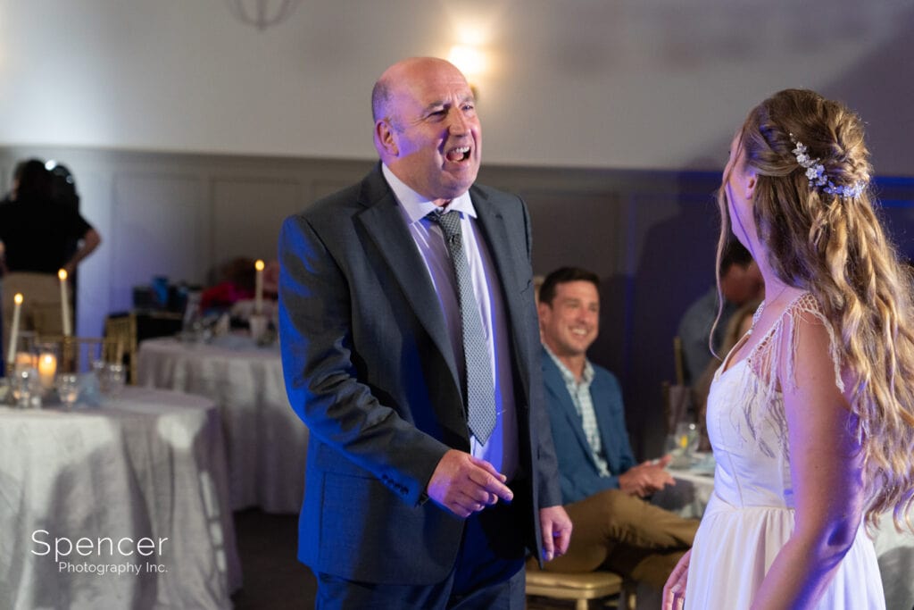 dad dancing with bride at wedding reception
