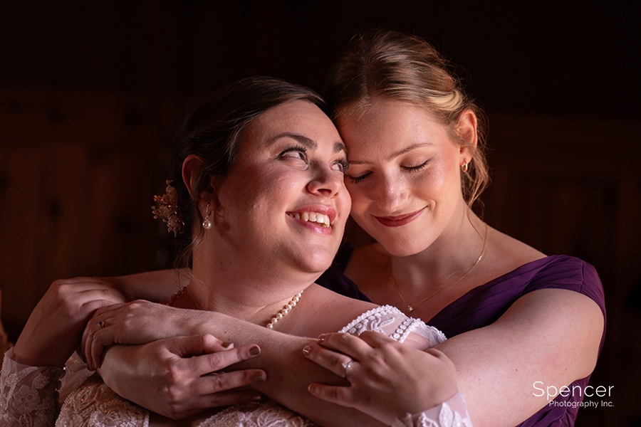  bride with maid of honor at Vrooman Mansion