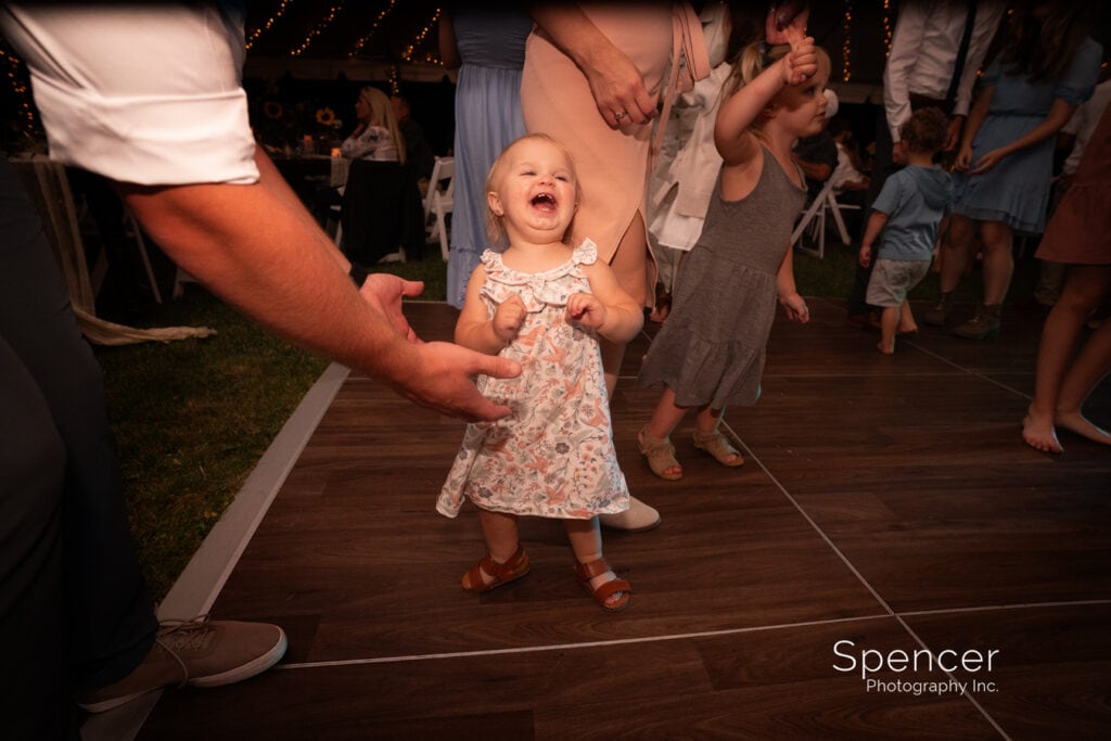  baby laughing at wedding reception