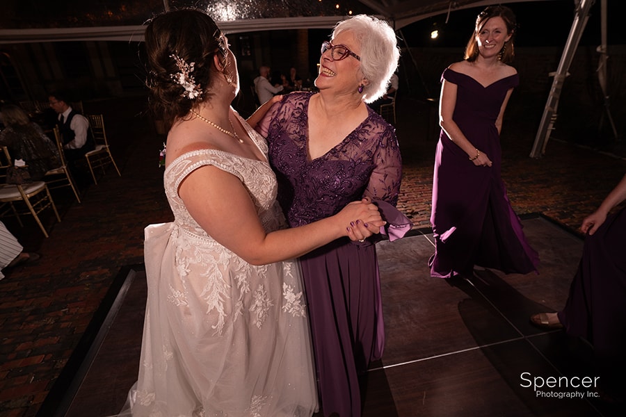 bride dancing with mom