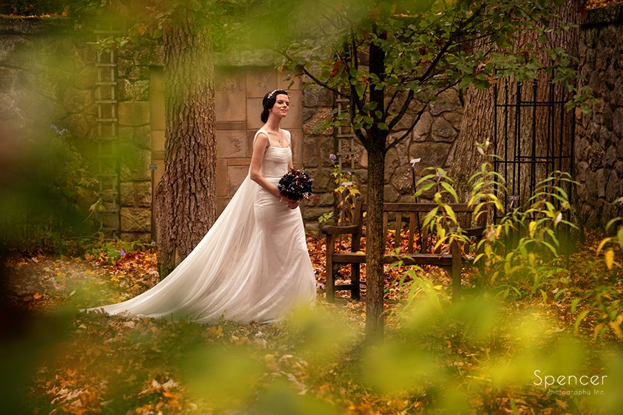bride walking to wedding day first look at Stan Hywet