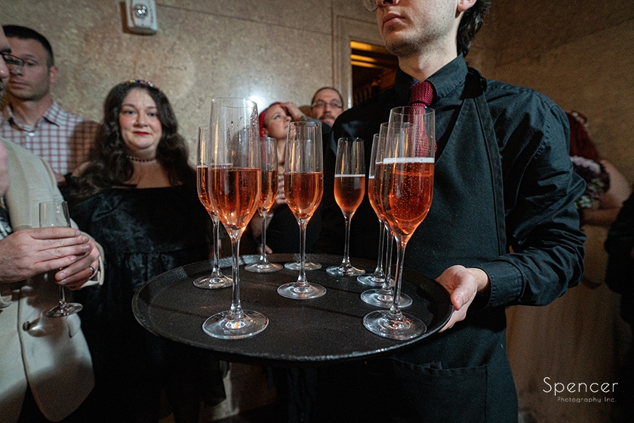 server distributing champagne at Marble Room wedding