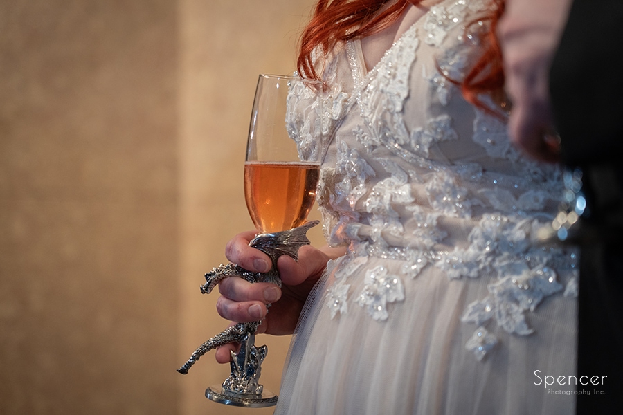bride holding champagne glass