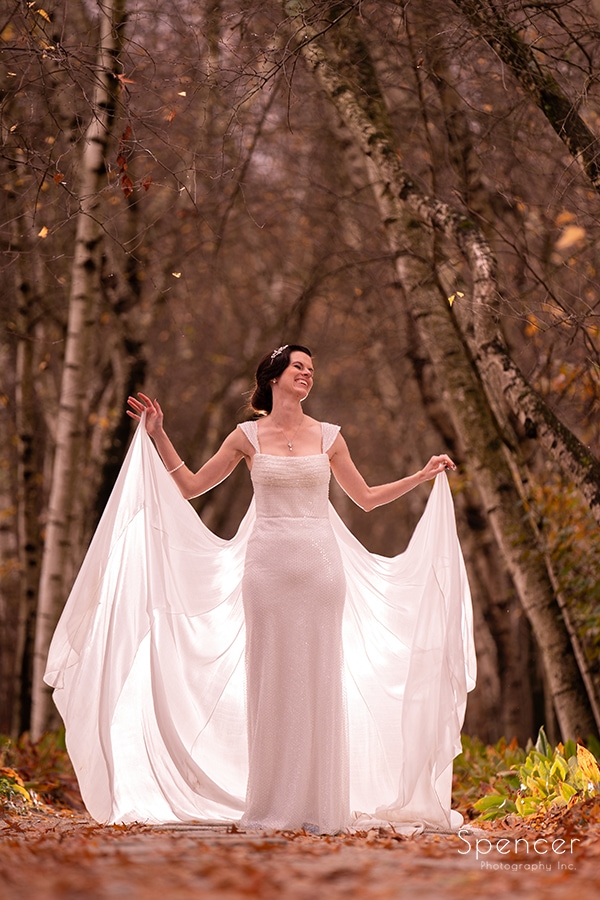 bride laughing in birch alley at stan hywet