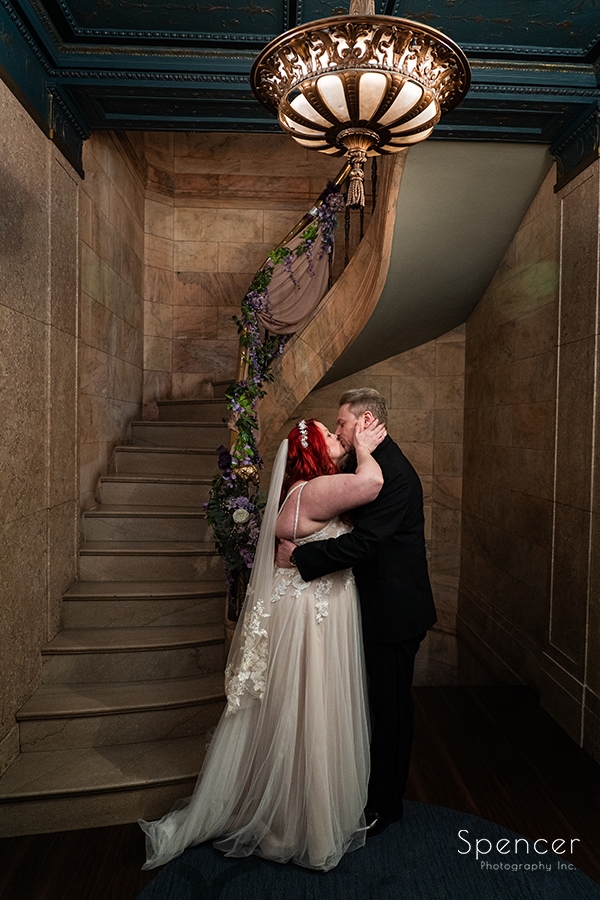 bride and groom kissing before wedding at Marble Room Cleveland