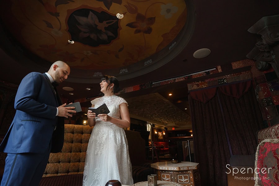 bride and groom exchanging vows at house of blues